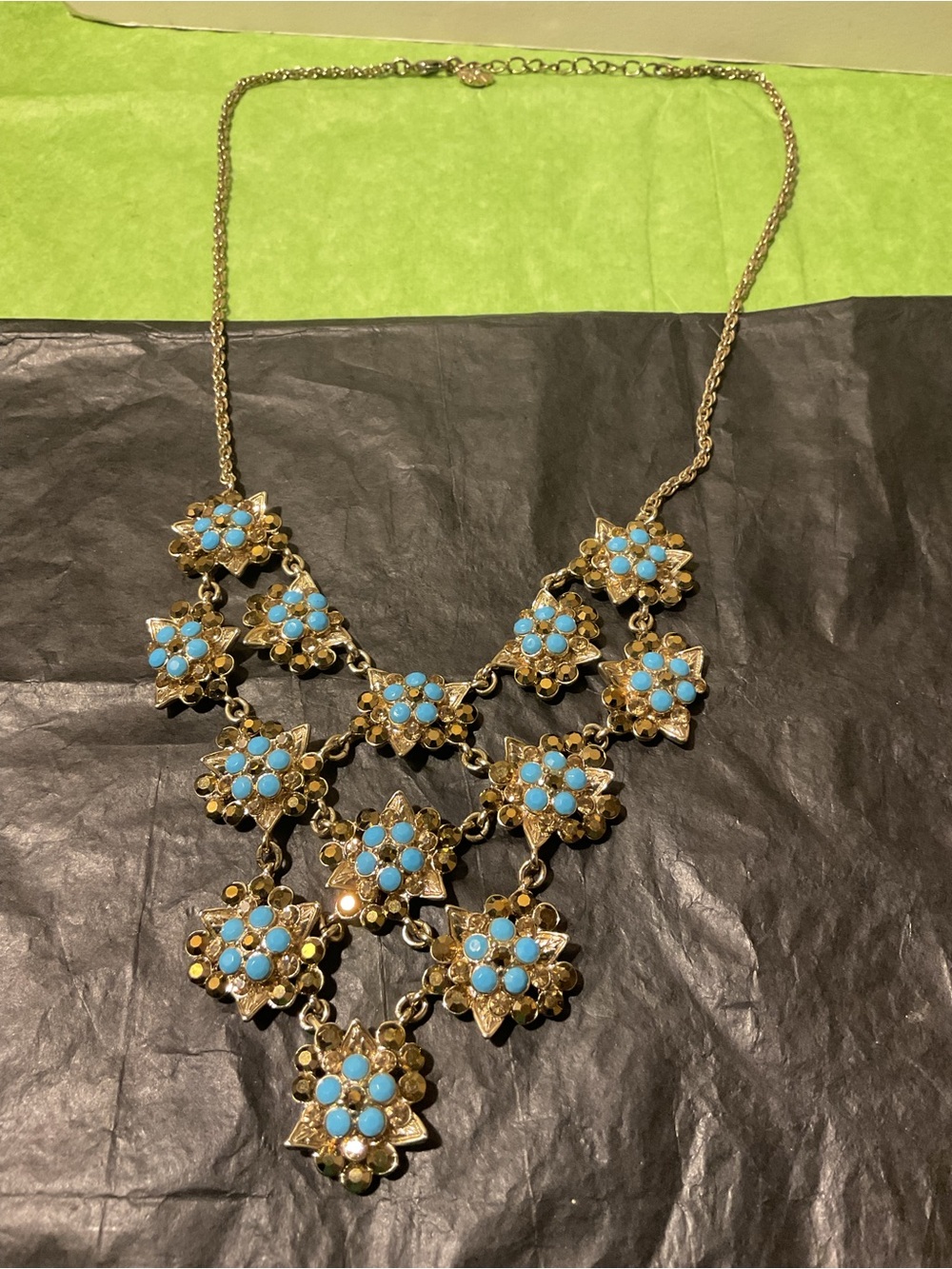 Gold Tone Money Floral Bib Necklace with Blue bead, rhinestones